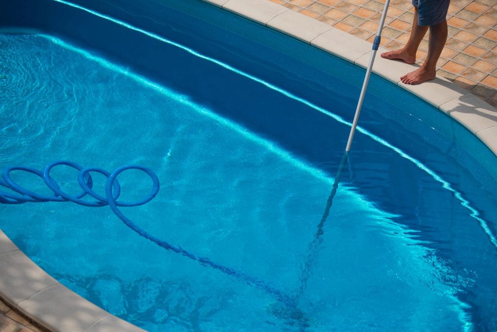 vacuuming the pool